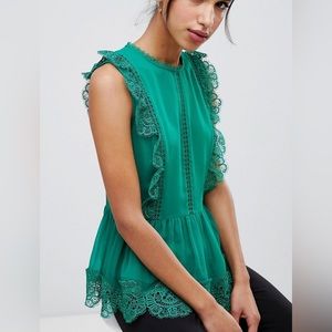 Ted Baker Omarri mixed lace peplum top. Women’s size 0